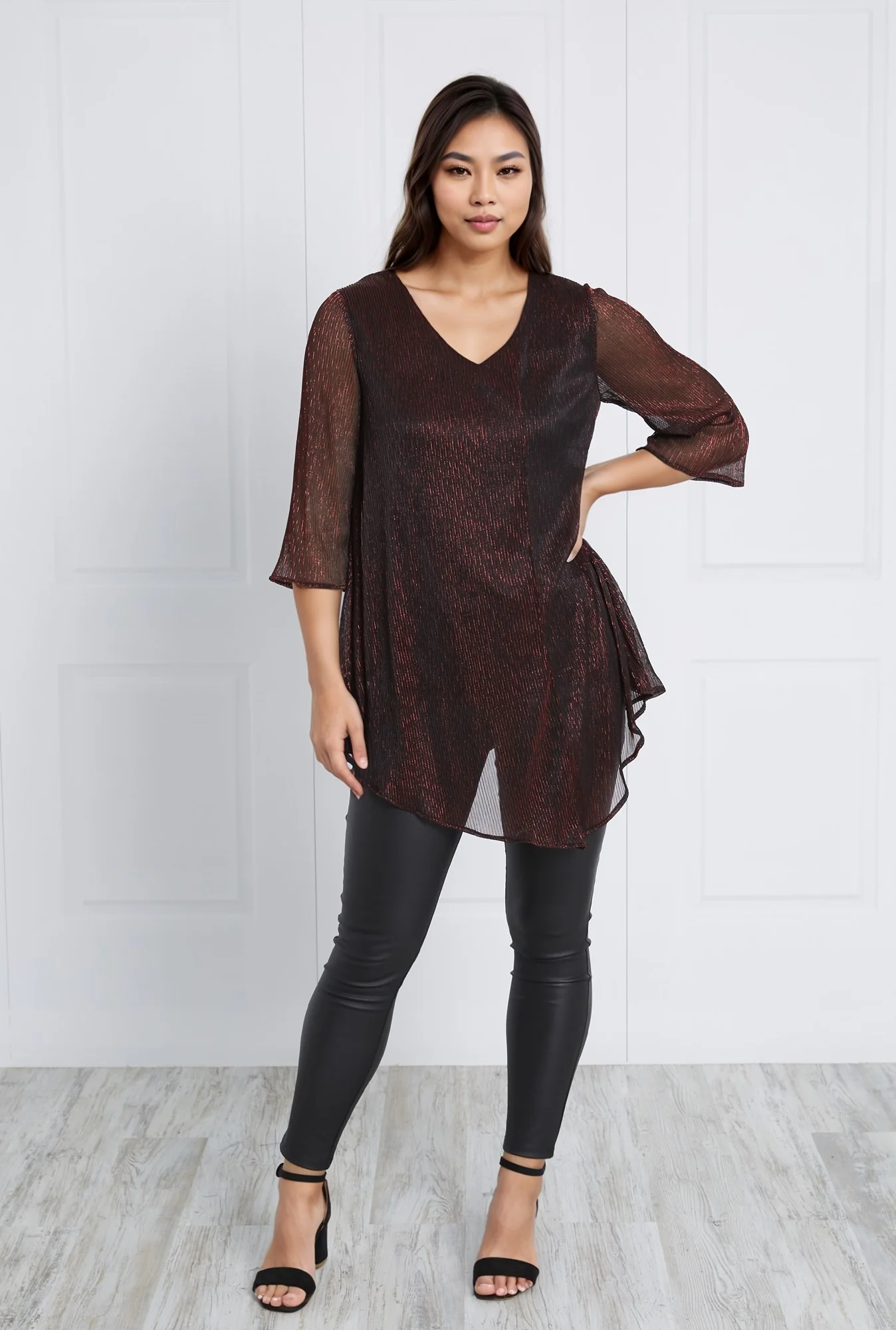ASYMMETRICAL HEM TOP
